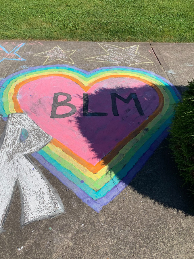 An example of the type of public art drawn in chalk outside the Camas Public Library in July.