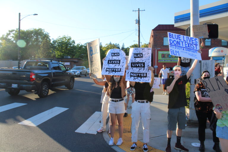 Opposing rallies -- one for Black Lives Matter, another for the pro-police "Blue Lives Matter" -- take place along Northeast Third Avenue in downtown Camas on Friday, Aug. 28. (Photos by Kelly Moyer/Post-Record)