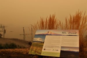 A sign shows the normal view of Mt. Hood and the Columbia River Gorge from Washougal Waterfront Park. On Friday, Sept. 11, that view was covered by a thick layer of smoke from wildfires burning in Oregon and California. The smoke has severely impacted air quality in Camas-Washougal. On Friday, air quality throughout Clark County was in the hazardous zone. (Photos by Kelly Moyer/Post-Record)