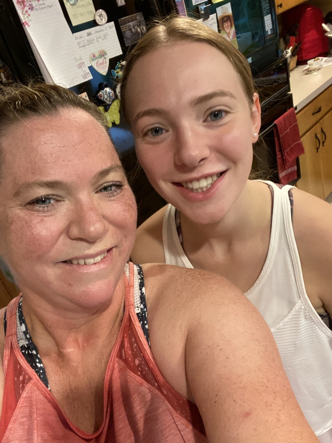 Washougal resident Jodi Miner (left) poses for a post-workout photograph with her daughter Erin, a Washougal High School senior. "For Erin, so many of her sports and other activities have gone by the wayside, so she's become my workout buddy," Jodi said. (Contributed photo courtesy Jodi Miner)