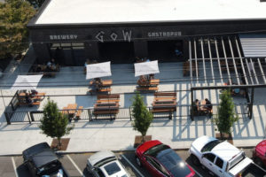 An overhead view of the Grains of Wrath Brewery in downtown Camas shows the restaurant's outdoor seating. Co-owner Brendan Ford said a forgivable federal loan has helped the brewery retain jobs during the COVID-19 pandemic. (Contributed photo courtesy of Brendan Ford)