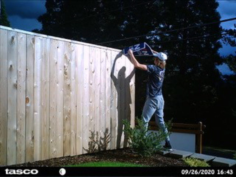A Washougal couple's outside camera captured this image of a person trying to tear down the couple's Biden-Harris campaign sign on Sept. 26. Washougal police have been unable to identify the suspect in the photos.
