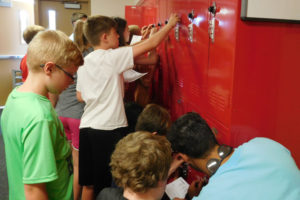 Liberty Middle School students gather at their lockers during the Camas School District's 2017-18 school year. (Post-Record file photo)