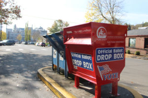 An official ballot drop box stands next to postal boxes on Northeast Fifth Avenue in downtown Camas on Oct. 16, 2020. (Kelly Moyer/Post-Record files)