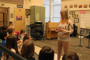 Grass Valley Elementary School music teacher Natalie Wilson (right) teaches a group of kindergarten students on Dec. 19, 2019. (Kelly Moyer/Post-Record files)