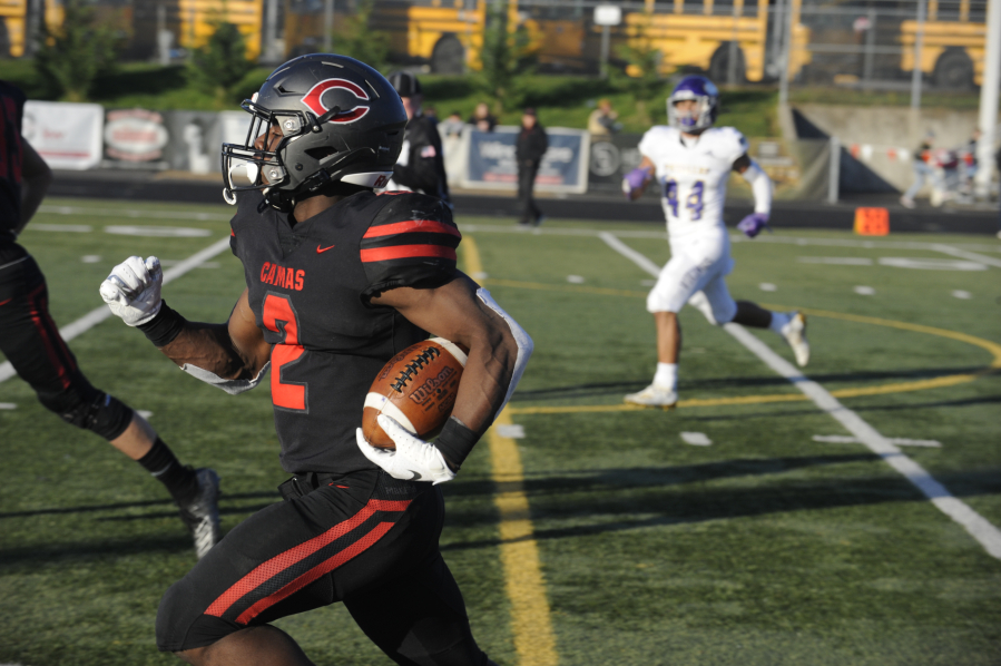 Camas running back Jacques Badolato-Birdsell runs for a touchdown during the Papermakers' state playoff game against Puallup on Nov. 23, 2019. (Post-Record file photo)