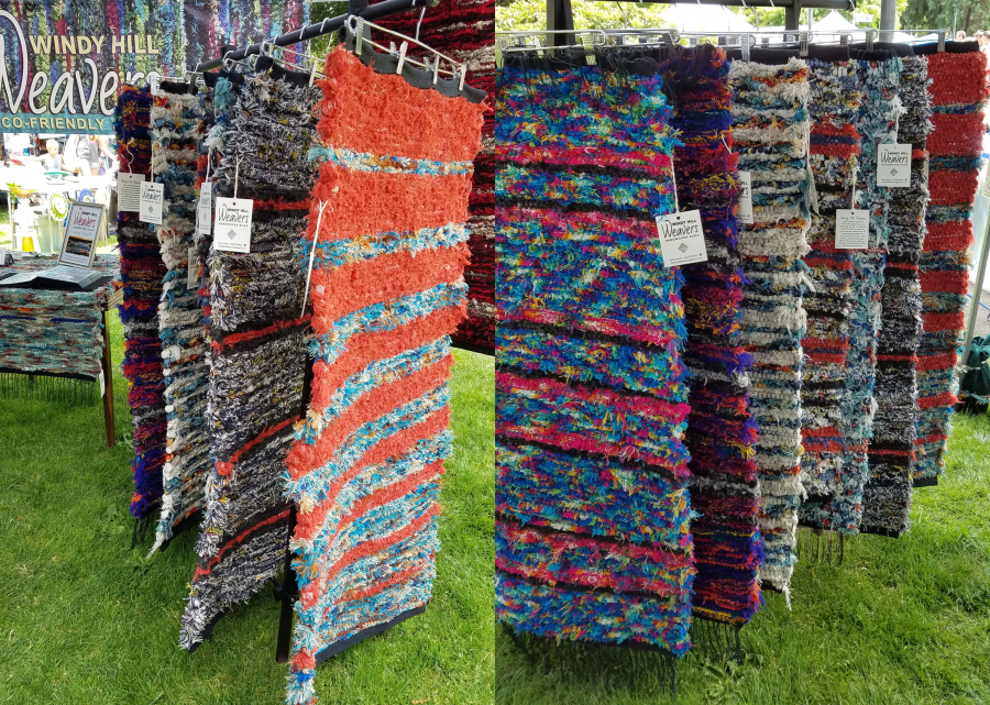 Contributed photo courtesy of Kathy Marty 
 A collection of Washougal weaver Kathy Marty's rugs, made of Pendleton Woolen Mills selvage, hang at a recent Recycled Arts Festival in Vancouver.