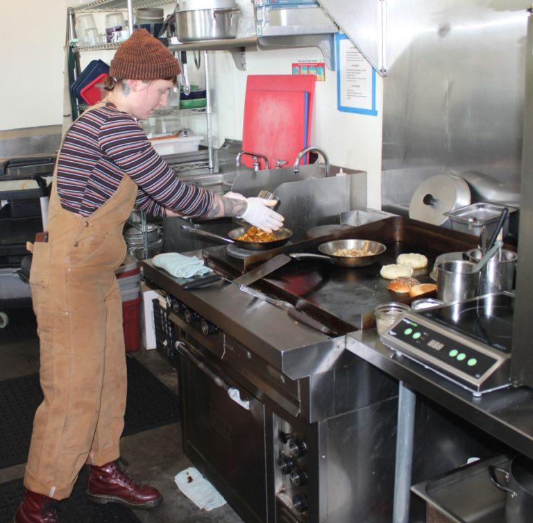 OurBar owner and chef Alex Yost prepares a meal at the restaurant on Nov. 22, 2019.