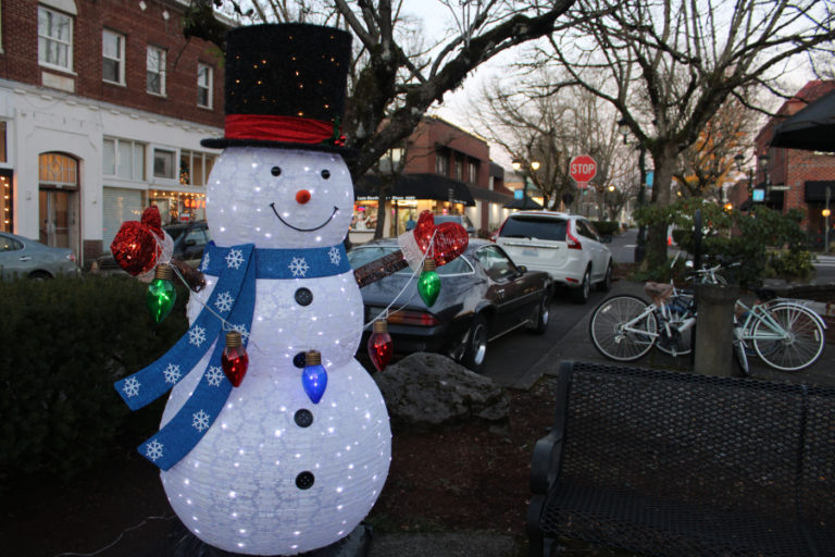 Frosty the snowman greets visitors along Northeast Fourth Avenue in the heart of downtown Camas on Friday, Dec.
