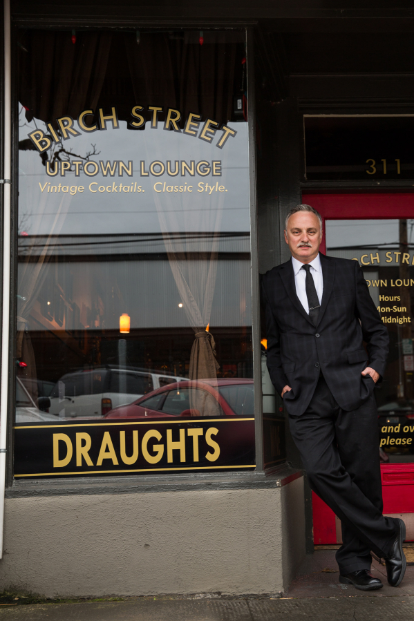 Owner Kevin Taylor stands by the front door of his Birch Street Uptown Lounge in Camas. Birch Street closed temporarily in November 2020, during the most recent round of statewide COVID-19 shutdowns. Taylor said he plans to &quot;hunker down&quot; until reopening is safe for his employees and customers.