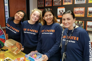 Unite! Washougal Community Coalition's Megan Kanzler (far right) participates in an activity with members of Washougal High School's PEP Unite! club. Unite! Washougal is one of eight drug-free coalitoins to be included in a case study that has been submitted to President-elect Joe Biden's transition team. (Contributed photo courtesy of Margaret McCarthy)