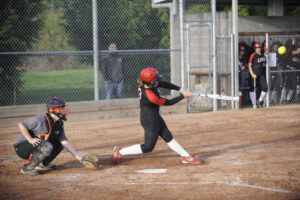Camas High School Sophie Franklin swings during a 2019 softball game. Franklin, a 2020 graduate, said she was shocked when her final high school softball season was canceled in the spring of 2020 due to the COVID-19 pandemic.