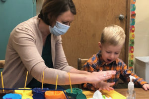 Teacher Becky Mininger works with Carson Stowe, 3, at the Camas-Washougal Parent Co-op Preschool in Camas.