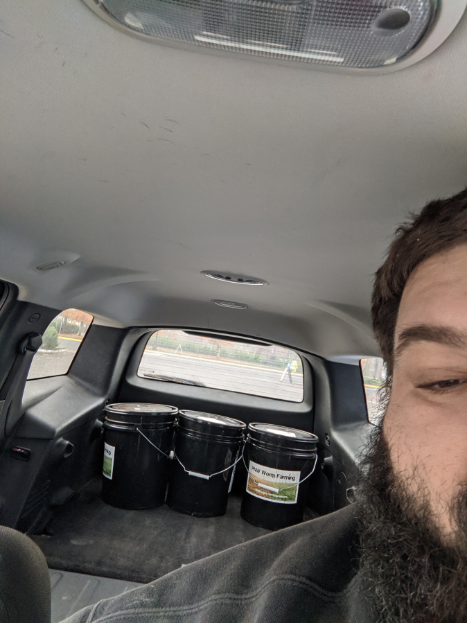 Washougal resident Brandon Higgins drives home after picking up three 5-gallon buckets of coffee grounds from Twin Perks Espresso in Vancouver.