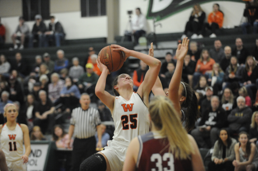 Washougal High School junior Skylar Bea (25) scores during a 2A District 4 tournament game against W.F. West on Feb. 17, 2020.