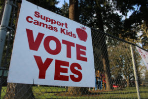 A sign supporting two Camas School District replacement levies is attached to a fence at Crown Park in Camas on Sunday, Jan. 17, 2021. (Kelly Moyer/Post-Record)