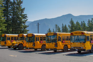 School buses wait at the Stevenson-Carson School District. The rural Skamania County school district reopened its elementary and middle schools to in-person learning with COVID-19 precautions in place on Jan. 19, 2021. (Contributed photo courtesy of Stevenson-Carson School District) 