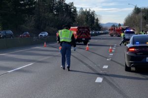 Emergency responders assist at the scene of a fatal, one-vehicle rollover crash on Highway 14 in Camas on Friday, Jan. 22, 2021. (Photos courtesy of Washington State Patrol Trooper Will Finn)