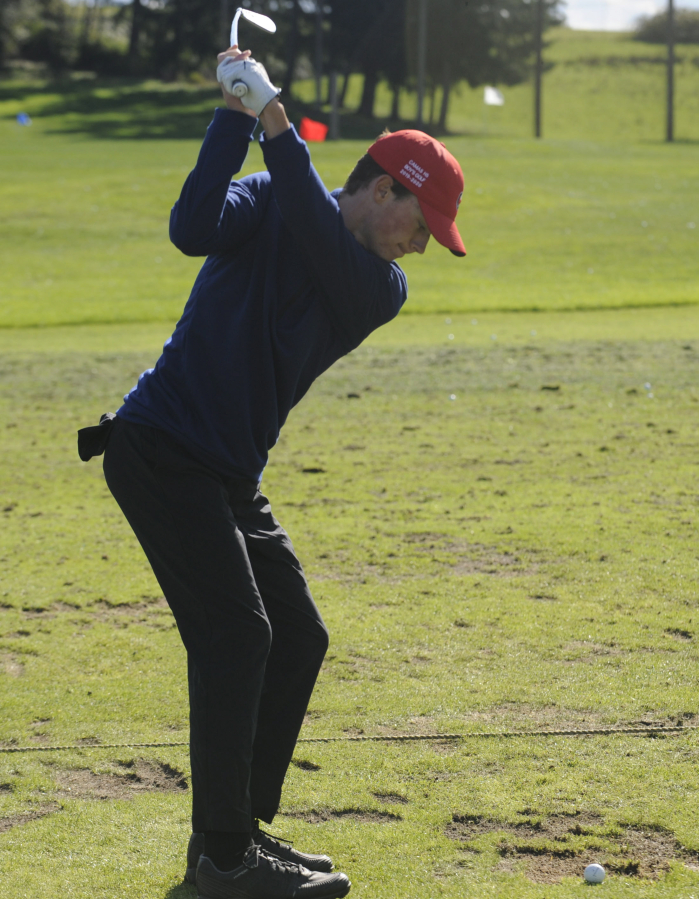 Camas golfer Owen Huntington practices his swing at Camas Meadows Golf Course in 2019.