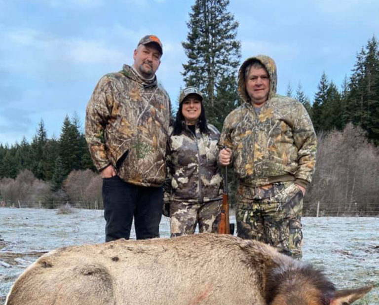 Contributed photo courtesy of Amy McNealy 
 Former Washougal resident Amy McNealy (center) leads an elk-hunting expedition as part of her work with The Fallen Outdoors, a nonprofit organization that facilitates hunting and fishing trips for military veterans.