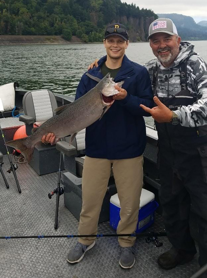 Washougal resident Keith Hyde (right) leads a salmon fishing expedition as part of his work with The Fallen Outdoors, a nonprofit organization that facilitates hunting and fishing trips for military veterans.