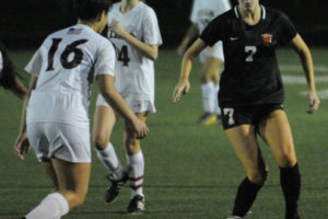 Washougal High School senior Lauren Snedeker (7), a Seattle Pacific University commit, is a midfielder -- and top scorer -- for the Washougal Panthers' girls soccer team. (Post-Record file photo)