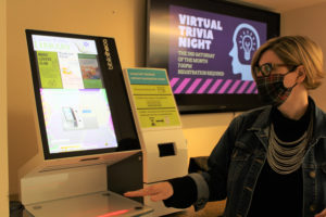 Camas Public Library Director Connie Urquhart shows the library's new "no-touch" check-out system on Friday, March 5, 2021. The library building, which has been closed since March 2020, will reopen at 25-percent indoor capacity on Monday, March 15, 2021. (Photos by Kelly Moyer/Post-Record)