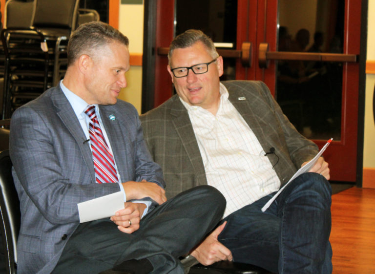 Camas School District Superintendent Jeff Snell (left) speaks with then-Camas Mayor Scott Higgins at a State of the Community address at Lacamas Lodge in Camas on Oct. 26, 2017.