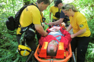 Silver Star Search and Rescue volunteers train for a wilderness rescue near Camas' Round Lake in 2015. (Post-Record file photo)