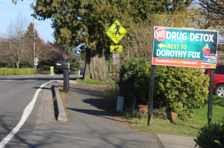A &quot;No Drug Detox Next to Dorothy Fox&quot; sign located on Northwest 23rd Avenue in Camas, points toward the former Fairgate Estates assisted living center on March 16, 2021.