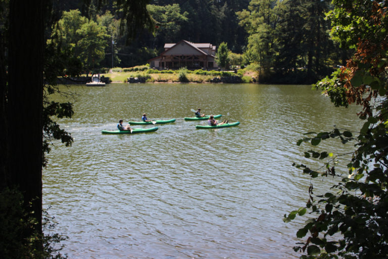 Kayakers on Camas' Lacamas Lake pass by Lacamas Lake Lodge on Sunday, July 26, 2020.