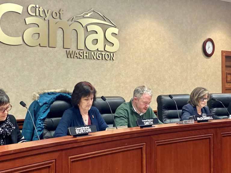 Camas City Council members Ellen Burton (left), Melissa Smith (second from left) and Shannon Roberts (right) listen to citizen comments with Camas Mayor Barry McDonnell (second from right) at a December 2019 city council meeting.