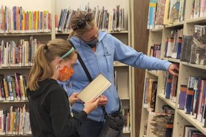 Washougal Community Library patrons look at books on April 20, 2021. (Contributed photo courtesy of Rachael Ries)