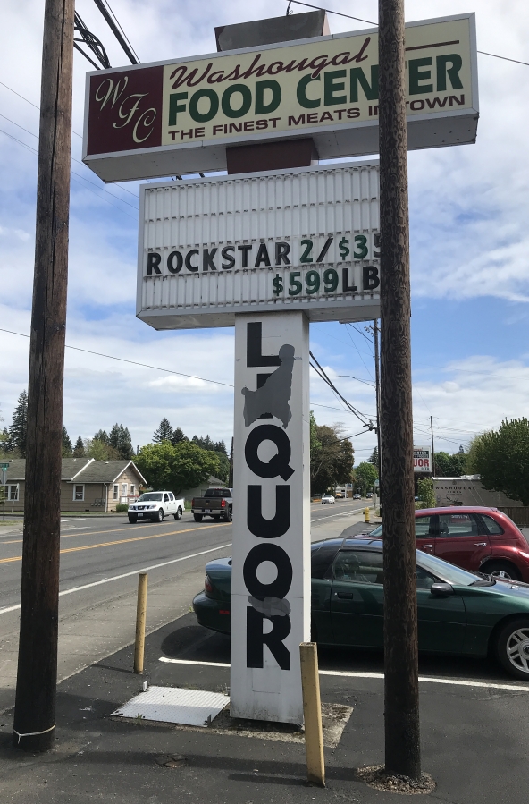 The metal post that supports the marquee readerboard in the parking lot of the Washougal Food Center, seen here in May 2021, will soon be covered by a Washougal-themed painting, courtesy of the Unite! Washougal community coalition.