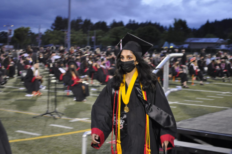 Camas High School seniors from the class of 2021 earn their high school diplomas during an in-person graduation ceremony with COVID-19 safety protocols -- including face coverings -- in place, held Friday, June 11, 2021, at Doc Harris Stadium in Camas.