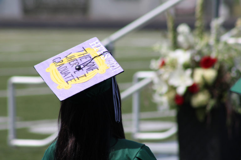 Right: A Hayes Freedom High School senior wears a cap decorated with the words  &quot;The One Where I Graduate&quot; at their school&#039;s graduation ceremony on Saturday, June 12, 2021.