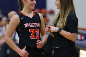 Washougal High School basketball player McKenna Jackson (left) recovered from a serious knee injury to return to the court for the Panthers' final three games of the 2020-21 season. (Contributed photo courtesy of Britney Ervin)