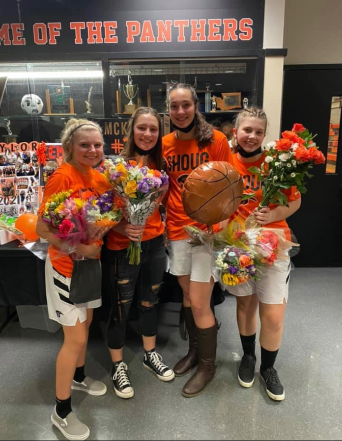 Contributed photo courtesy Britney Ervin 
 McKenna Jackson (second from left) stands with the Washougal High School girls basketball team&#039;s three other seniors during a &quot;Senior Night&quot; event in late May.