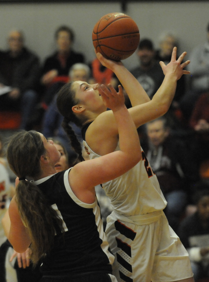 Post-Record file photo 
 Washougal High School basketball player McKenna Jackson attempts a shot during the 2019-20 season.