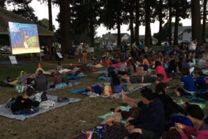 Camas area families watch "Moana" at Crown Park in 2017, during the Camas' Parks and Recreation's "Movies in the Park" series. (Contributed photo courtesy of the city of Camas Parks and Recreation)