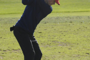 Camas High School golfer Owen Huntington practices his swing at Camas Meadows Golf Course in 2019. (Post-Record files)