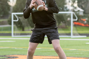 Washougal High School football player Holden Bea practices his throwing skills. Bea, a sophomore, will participate in 'The Northwest 9,' an event showcasing the Pacific Northwest's best high school quarterbacks, Aug. 6-8, in Yakima, Wash. (Contributed photo courtesy of Holden Bea)