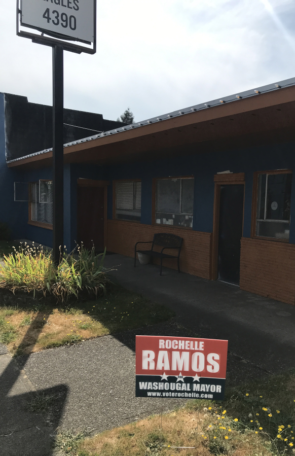 A sign promoting Washougal mayoral candidate Rochelle Ramos stands in front of the Washougal Eagles lodge in downtown Washougal on July 27, 2021. Ramos said one of her signs was stolen from the property in early July.