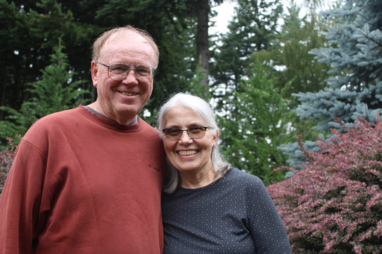 Ken and Marge Crouch stand in their 1.7-acre garden in Camas on Friday, Aug. 6. The couple&#039;s garden is one of 13 featured in the Clark County Green Neighbors&#039; virtual 2021 Natural Garden Tour.