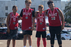 Camas Heat members (left to right) Lincoln Fogle, Max Gibson, Jaxson Sullivan and Ben  Deochand celebrate after winning the boys 11-and-under division championship at the Oregon Hoopla 3-on-3 Basketball Tournament in Salem, Ore., on Aug. 8, 2021. (Contributed photo courtesy of Jeremy Fogle)