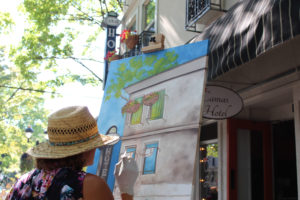 Artist Liz Pike paints outside the Camas Hotel during the 2018 Plein Air event in downtown Camas. (Kelly Moyer/Post-Record files)