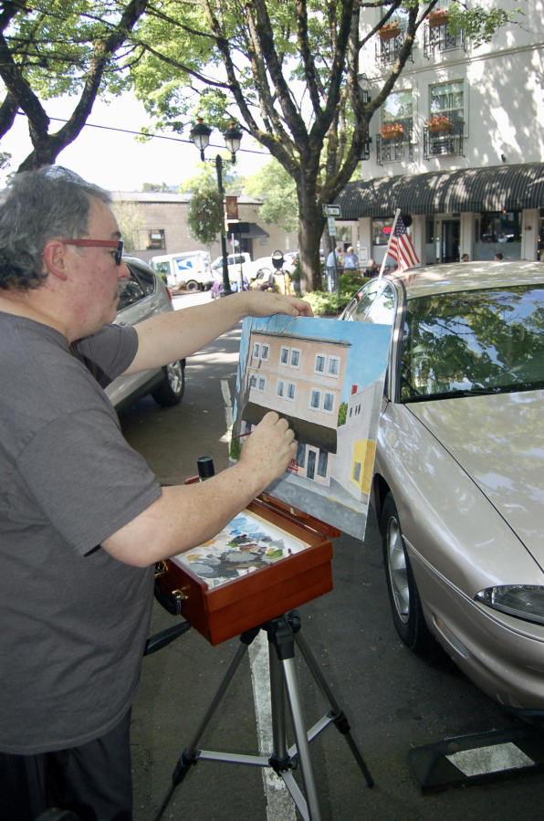 Contributed photo courtesy of the Downtown Camas Association 
 Artist Randy Cole paints near the Camas Hotel during the 2019 Plein Air event in downtown Camas.