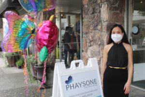 Phaysone Camp celebrates before the ribbon-cutting for her new Phaysone Skincare business on Friday, Sept. 3, 2021. (Kelly Moyer/Post-Record)
