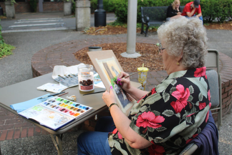 Artist Claudia Arvidson paints during the the 2021 Plein Air art event in downtown Camas on Friday, Sept.