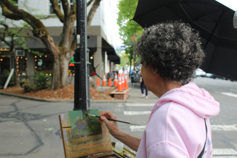 Artist Beth Norwood works on an oil painting during the 2021 Plein Air art event on Friday, Sept. 3, 2021.